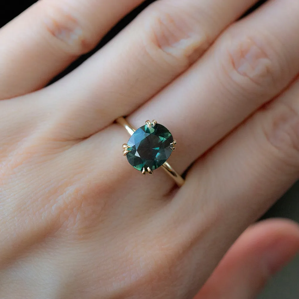 3.02ct Oval Deep Teal Green Sapphire Double Pronged Solitaire in 14k Yellow Gold